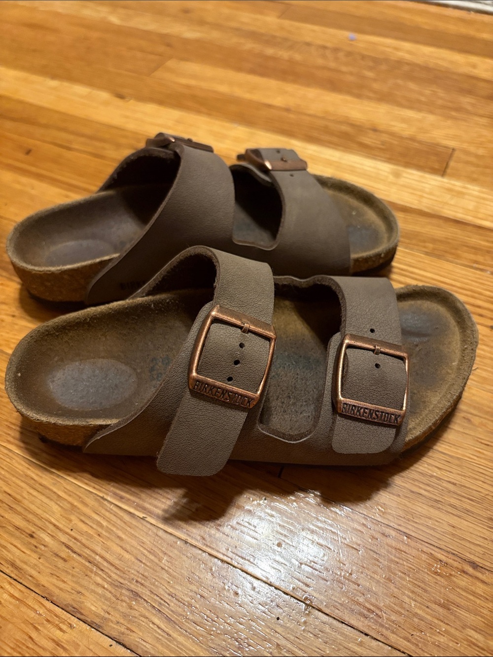 Birkenstock Arizona Sandals in Dark Brown with Copper Buckles
